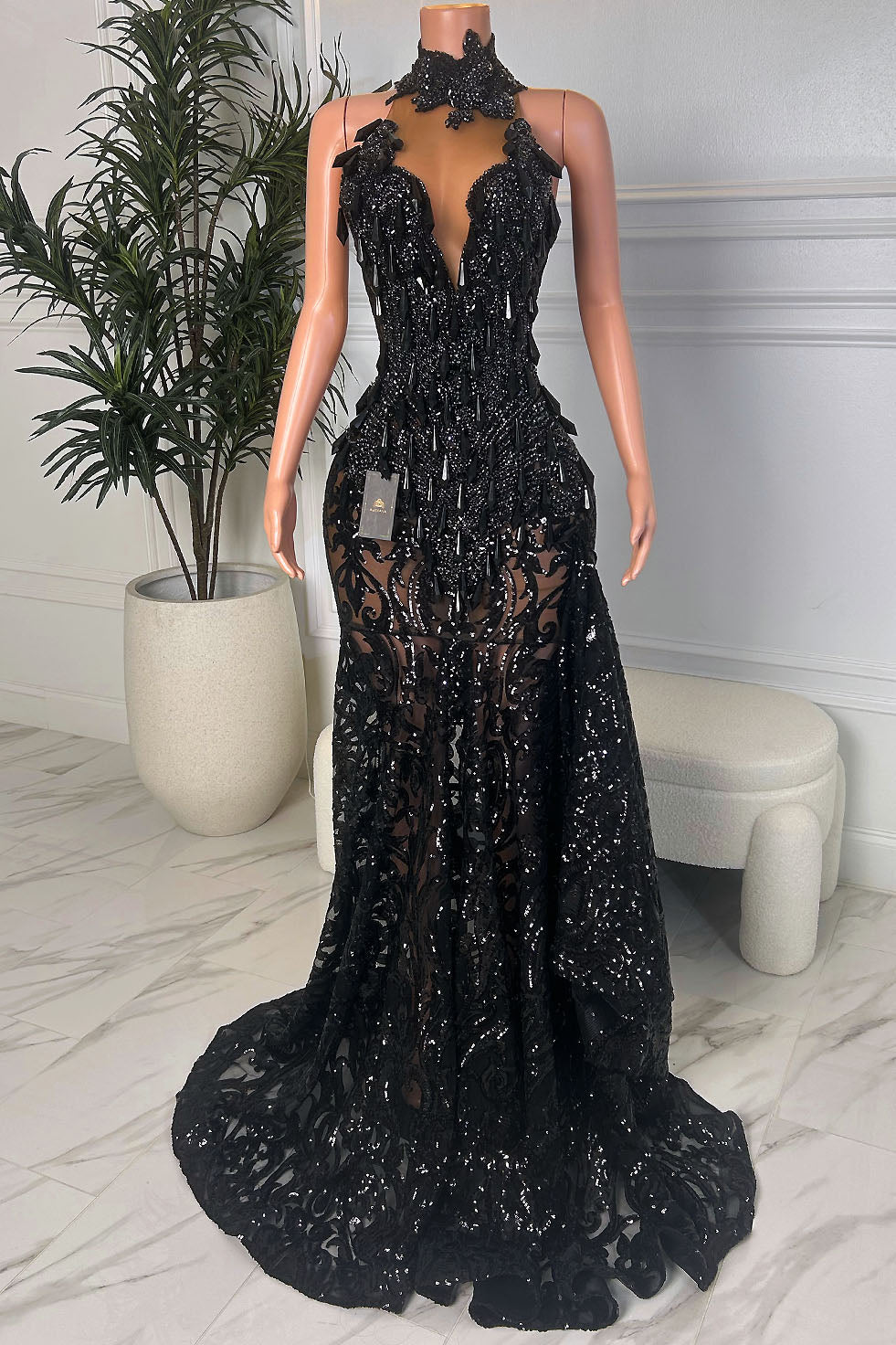 Black sequin lace halter mermaid gown with plunging illusion neckline, high collar, and dramatic floor-length train
