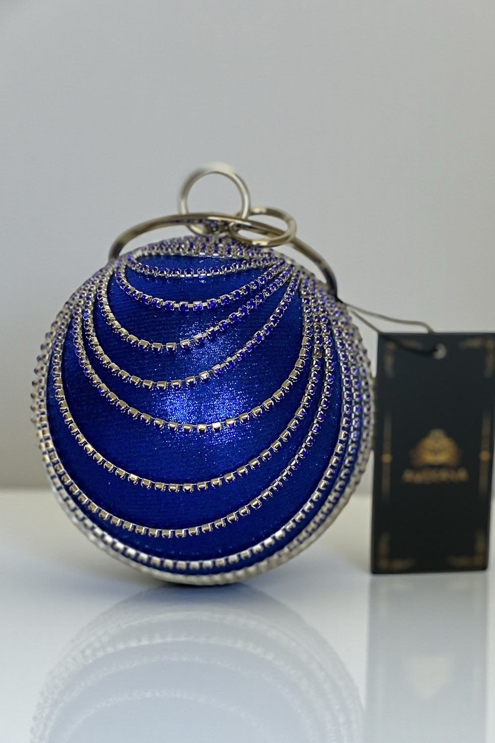 Sapphire blue spherical rhinestone evening bag with jeweled circle handle ring statement clutch full view