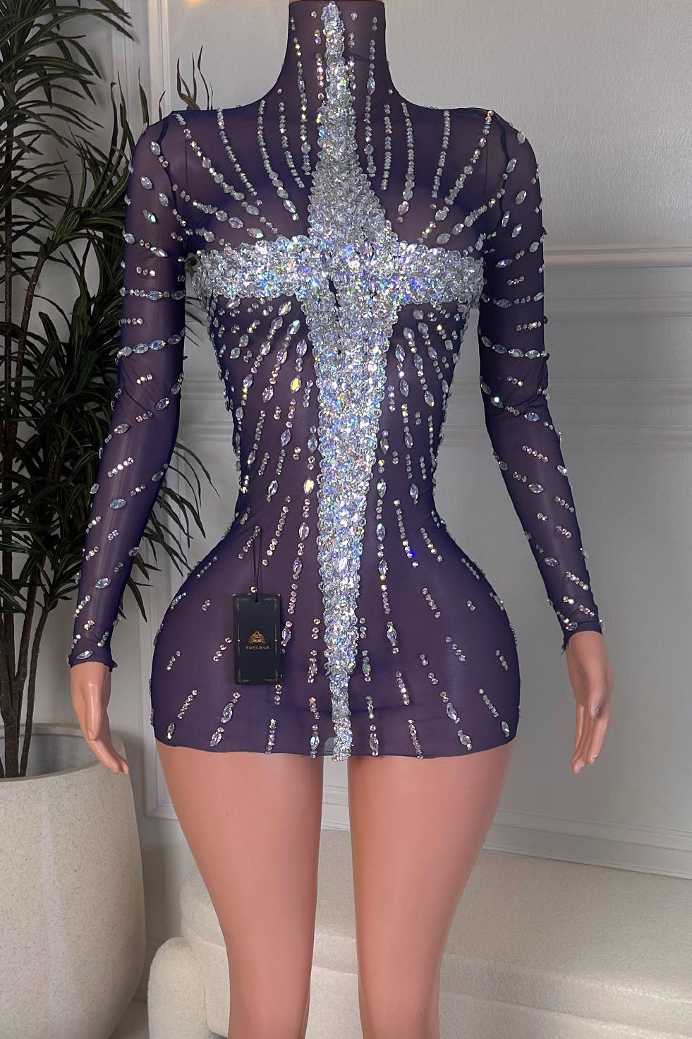 Purple sheer long sleeve high neck mini dress with rhinestone cross centerpiece and allover crystal embellishments