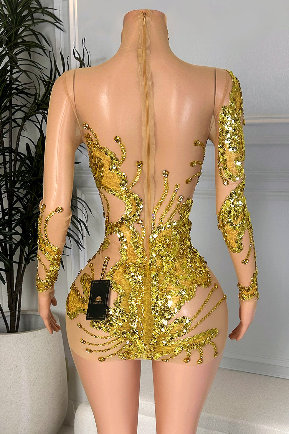 Back view of nude illusion gold sequin rhinestone mini dress with sheer mesh and zipper closure, Amekana