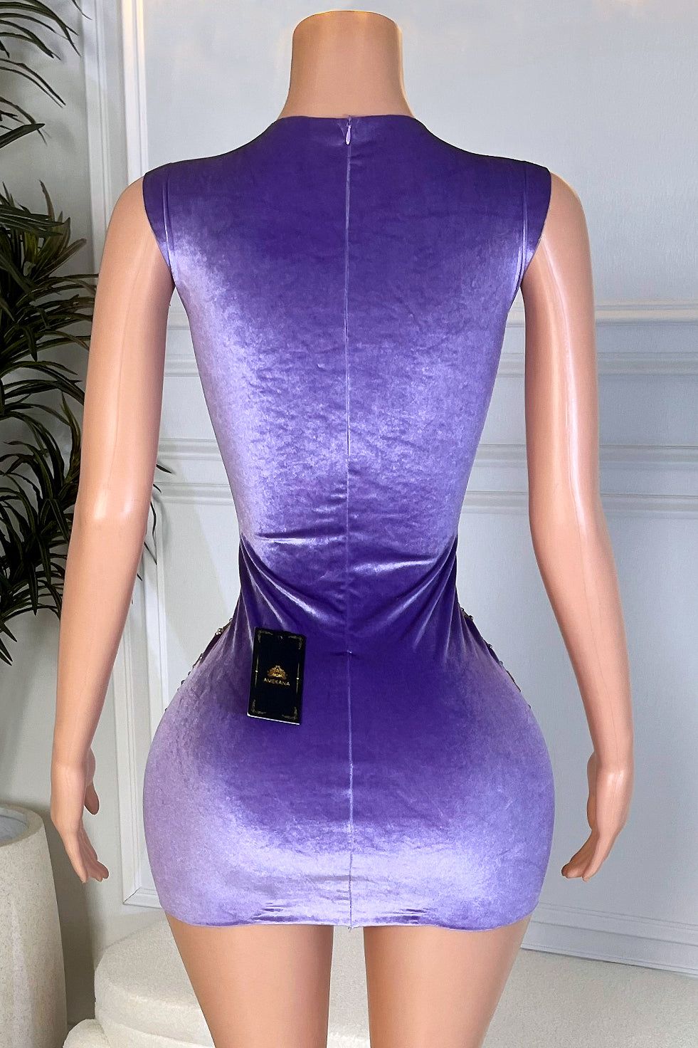 Back view of a purple ombre velvet birthday mini dress from Amekana, showing the smooth fitted silhouette that hugs the waist and hips.