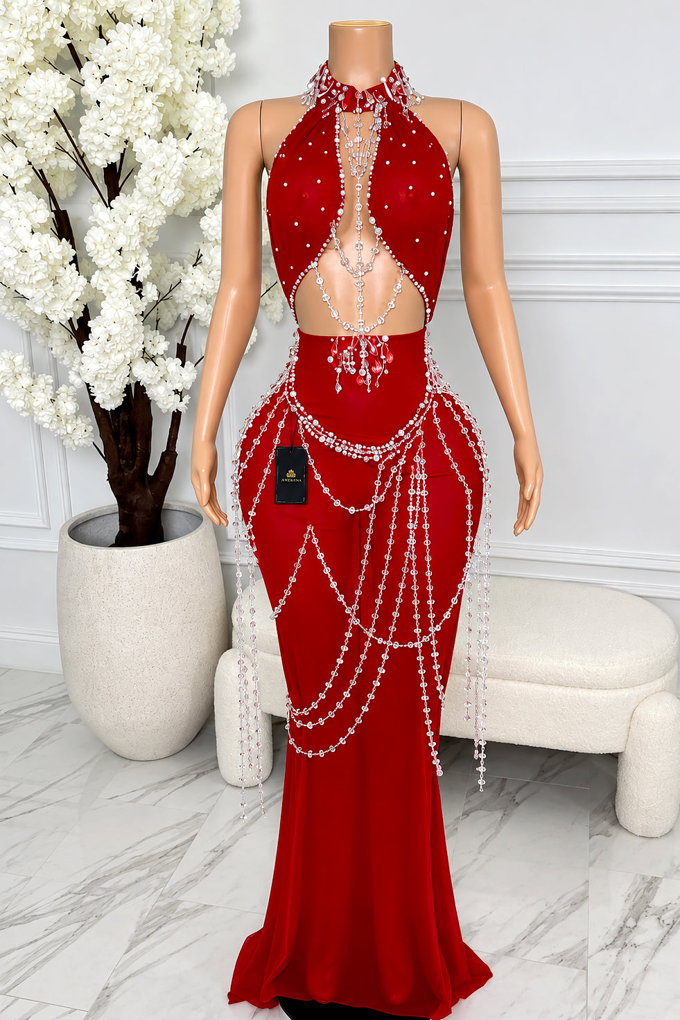 Front view of Zarevia red halter maxi dress with plunging midriff cutout, rhinestones, silver crystal chain draping and fitted skirt